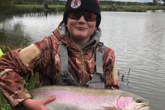Lachlan Peaston with his 13.5lb trout at Bowden Springs. Contributed by his father, Andrew.