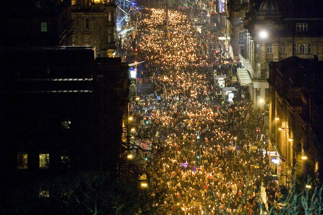 The Edinburgh Torchlight procession makes its way along Princes Street.
Photo by Ian Georgeson.