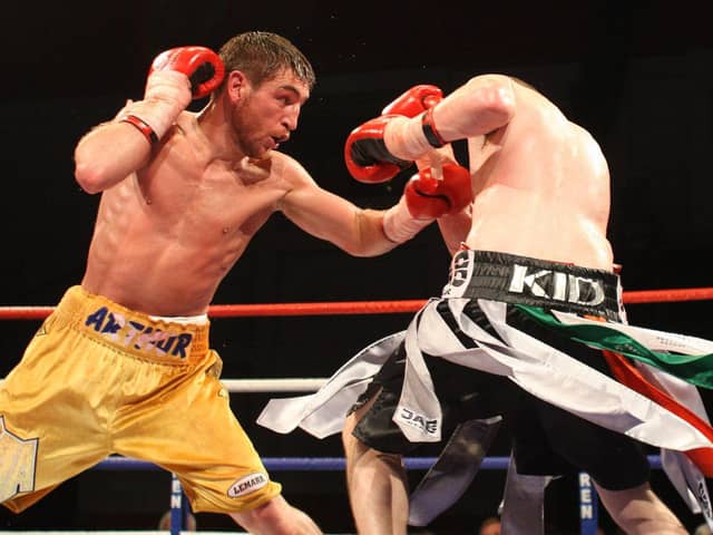 Alex Arthur, left, in action against Peter McDonagh at Glasgow's Kelvin Hall in 2010 (Picture: Lynne Cameron/PA)