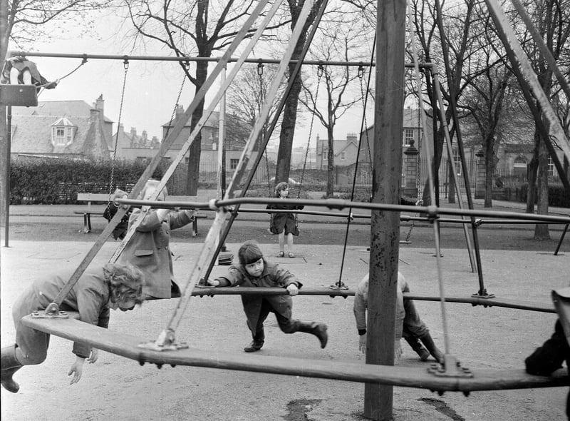 Children can be playing on the roundabout in St Margaret's Park Corstorphine in 1964.