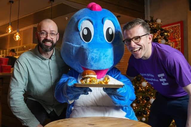 Staff at Street Burger at St James Quarter celebrating the launch. Pictured are Tim Joaquim (General Manager Street Burger), Lawrence Cowan and Spiney.