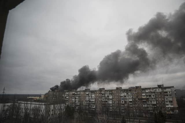 Smoke rise after earlier shelling by Russian forces in Mariupol
(AP Photo/Evgeniy Maloletka)