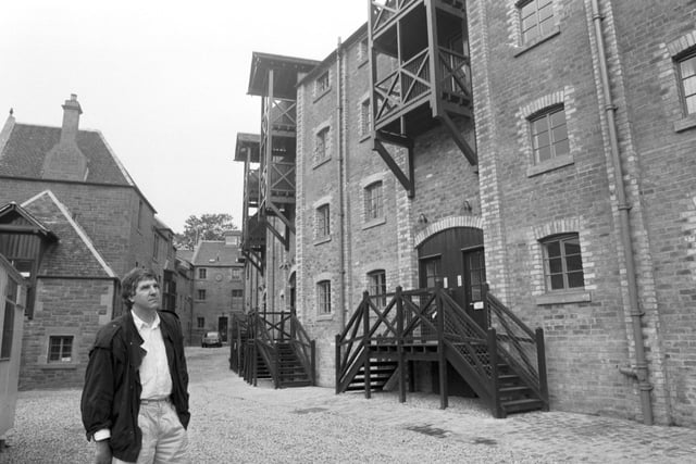Architect Nick Groves outside Craigwell Brewery, newly converted to houses, in Calton Road Edinburgh. Picture taken July 1987.