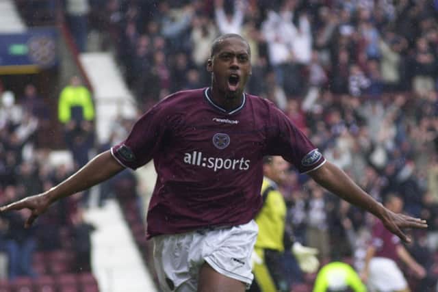 Hearts' Mark De Vries celebrates his second goal against Hibs at Tynecastle on August 11, 2002. De Vries scored four times in the 5-1 rout. Pic: Andrew Stuart