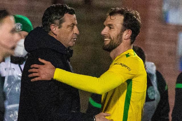 Jack Ross congratulates Christian Doidge after the Hibs striker scored twice against Queen of the South.