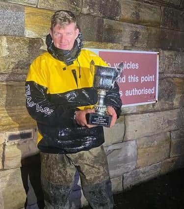 Jamie McHale and the Bass Rock Shore Angling League winter league trophy. Picture contributed