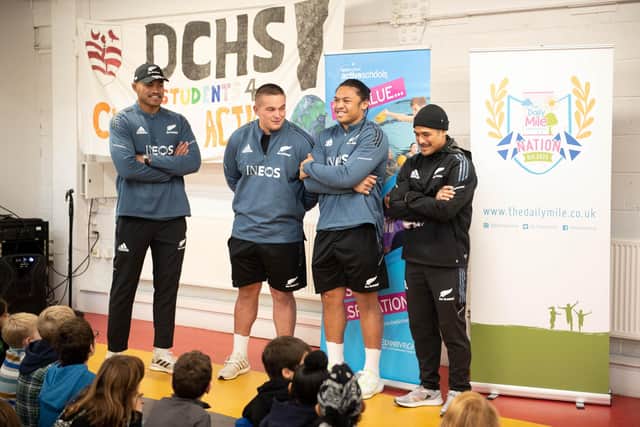 The New Zealand players took time out to talk to the pupils.