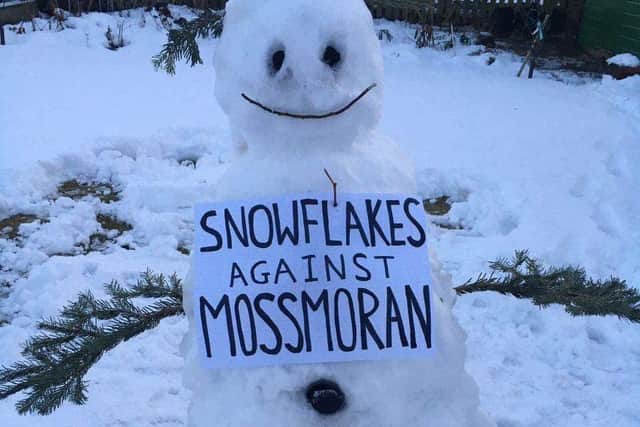 Members of the protest group Actions Speak Louder Than Words has been staging demonstrations since the group was formed in October, but their latest campaign employed stand-in snowfolk in order to stay withing lockdown rules on gatherings