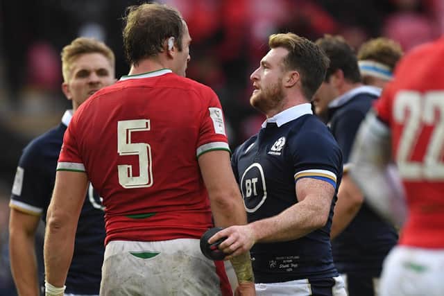 Wales captain Alun Wyn Jones, who broke the world record for most Test caps on Saturday, is consoled by Stuart Hogg at full-time. Picture: Stu Forster/Getty Images