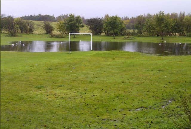 The waterlogged football pitch in Loanhead.