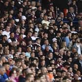 The Hearts fans in attendance at the away end at Ibrox. Picture: SNS
