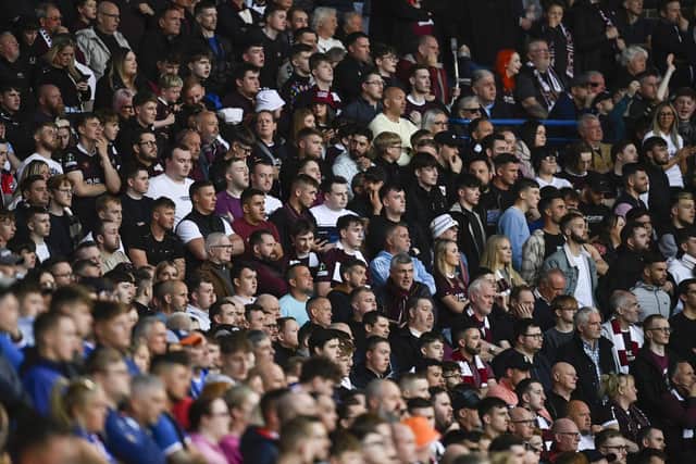 The Hearts fans in attendance at the away end at Ibrox. Picture: SNS