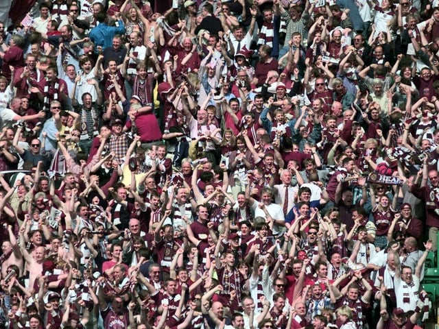 Fans celebrate as Hearts beat Rangers in the 1998 Scottish Cup final 2-1 at Parkhead to claim their first major honour since 1962.