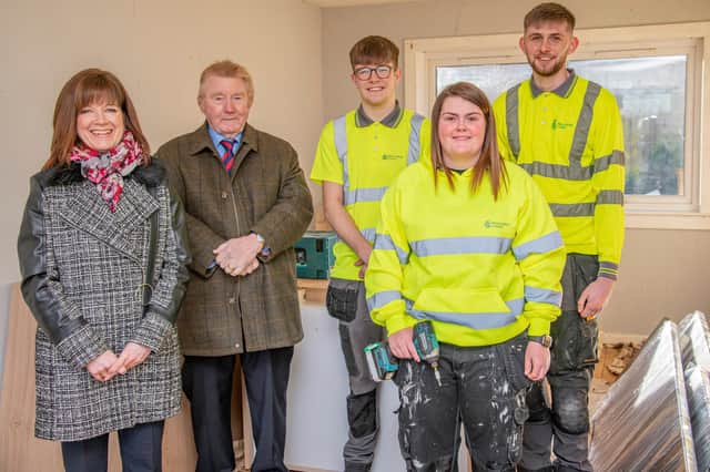 (Left to right) Interim Head of Housing, Customer and Building Services Julie Whitelaw, Councillor George Paul and Callum, Jack and Hannah.