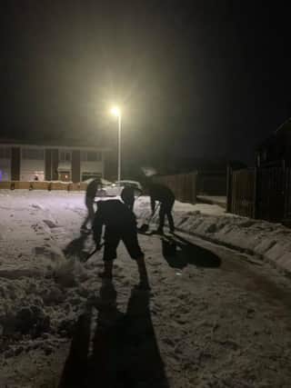The five men at work last night to clear the street for Lyle (Photo: Lyndsey Cormet).