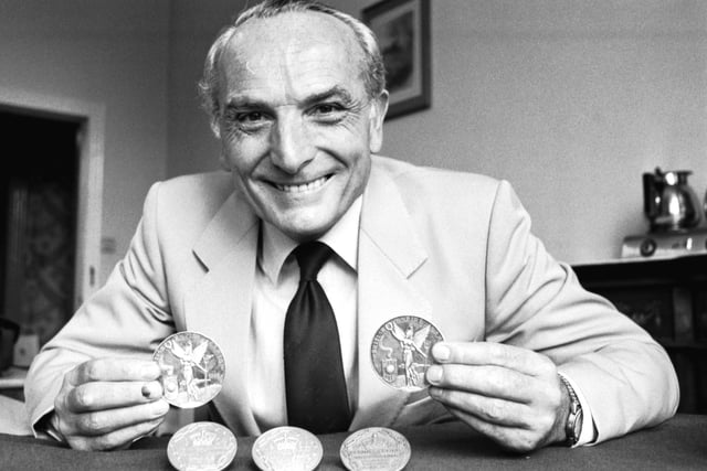 Empire Games and Commonwealth Games gold medal-winning diver Peter Heatly, chairman of the  Commonwealth Games Federation in Edinburgh 1986, with the medals he won over three Commonwealth Games.