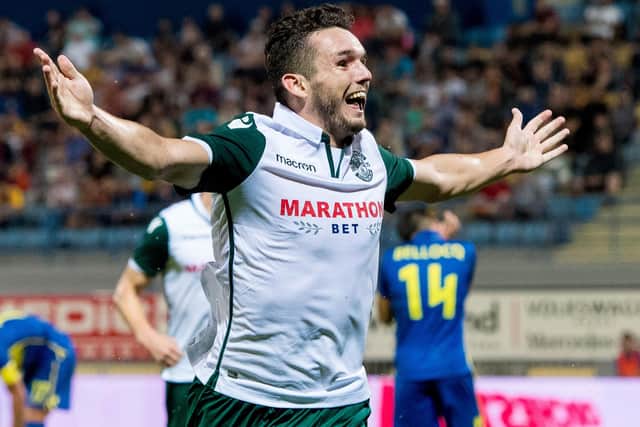 McGinn celebrates his strike for Hibs against Asteras Tripolis in Greece during the second leg of the Europa League second qualifying round tie in August 2018. Picture: Ross Parker / SNS Group