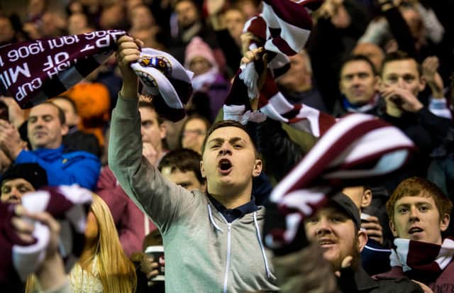 Hearts fans are organising a mass twirly tin tribute to Marius Zaliukas against Aberdeen. Picture: SNS