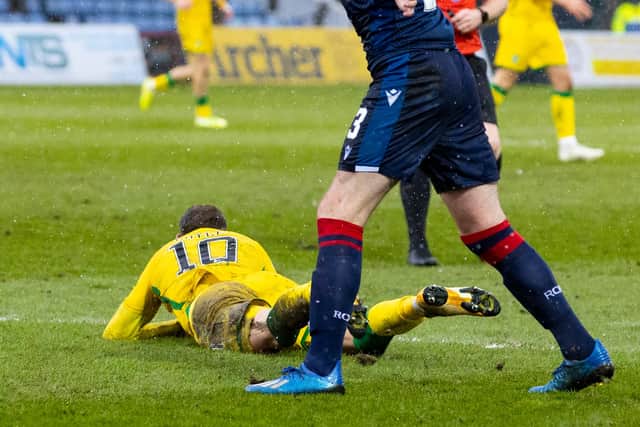 Boyle lies on the turf after winning the penalty