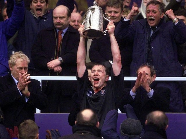 Scotland captain Andy Nicol holds up the Calcutta Cup after Scotland defeated England 19-13 at Murrayfield, 2 April 2000.