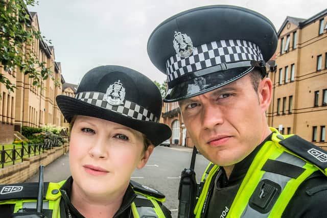 PC Sarah Fletcher, played by Sally Reid, with Jordan Young as PC Jack McLaren in Scot Squad