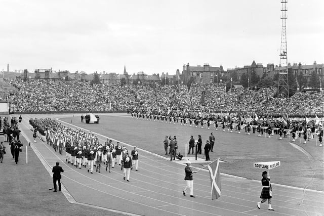 The Scottish team parades around the track at the opening ceremony of the 1970 Commonwealth Games.