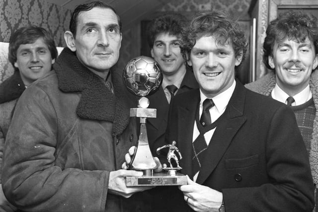 Evening News sports writer Stewart Brown presents the Man of the Match award to Celtic footballer Roy Aitken after the Hibs v Celtic match on December 31, 1983. Also in picture are team-mates (l-r) Tom McAdam, Peter Latchford and Brian Whittaker.
