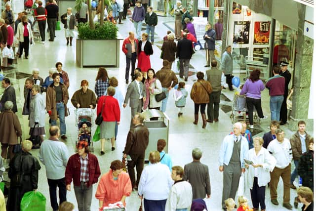 The Gyle shopping centre opens in October 1993. This image shows the food court packed with shoppers
