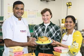 Praveen (left) and his wife Swarna (right) with Ashley Connolly, Asda's Buying Manager for Scotland