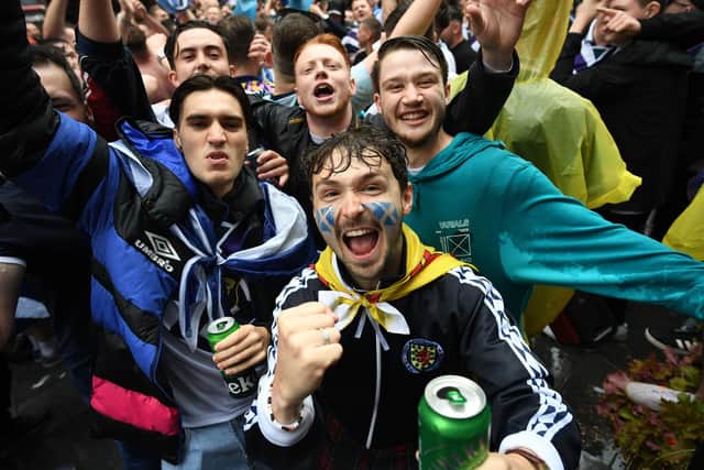 Scottish fans gather in Leicester Square in central London, ahead of the UEFA Euro 2020 match between England and Scotland at Wembley Stadium. Picture date: Friday June 18, 2021. PA Photo. Photo: Stefan Rousseau/PA Wire