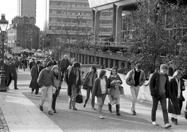 University of Edinburgh students strolling around the Student Centre in Bristo Square, December 1985.