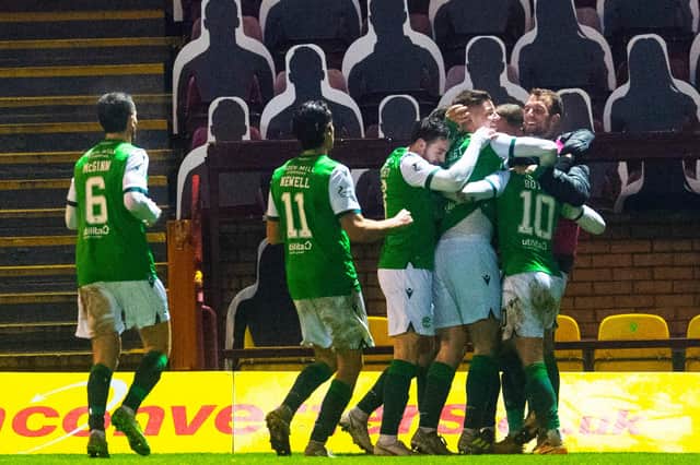 Hibs' players celebrate Martin Boyle opening the scoring during the Scottish Premiership match between Motherwell and Hibernian at Fir Park on December 05, 2020 (Photo by Craig Foy / SNS Group)