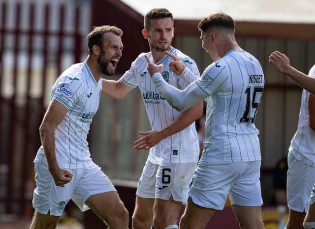 Doidge and Kevin Nisbet celebrate a goal against Motherwell at the start of the season