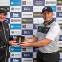 Paul Lawrie, who set up the Tartan Pro Tour, presents Neil Fenwick with a watch after one of his victories on the circuit last season. Picture: Kenny Smith