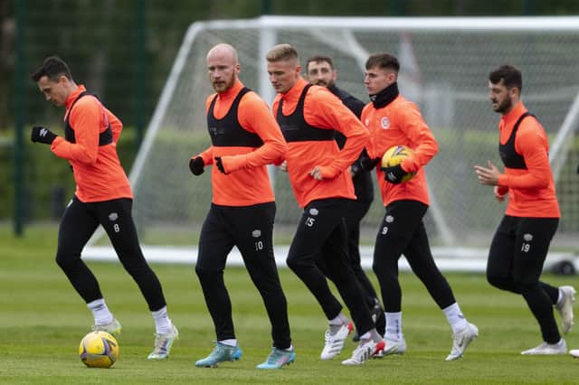 The Hearts squad are put through their paces at training on Friday morning. Picture: SNS