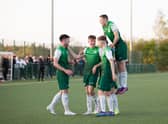 The Hibs players celebrate Connor Young's goal to make it 3-0 against Celtic. Picture: Maurice Dougan