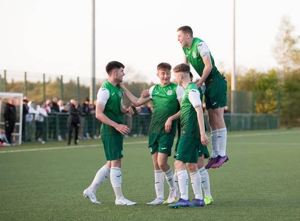 The Hibs players celebrate Connor Young's goal to make it 3-0 against Celtic. Picture: Maurice Dougan