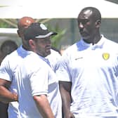 Hibs boss Lee Johnson, left, talks to his Burton Albion counterpart Jimmy Floyd Hasselbaink in the Algarve. Picture: Craig Foy / SNS Group