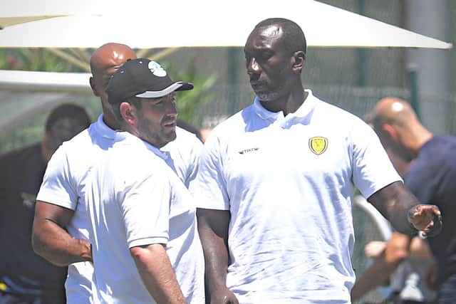 Hibs boss Lee Johnson, left, talks to his Burton Albion counterpart Jimmy Floyd Hasselbaink in the Algarve. Picture: Craig Foy / SNS Group