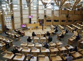 The Scottish Parliament's chamber was laid out in a semi-circle in the hope of making politics less confrontational (Picture: Andrew Cowan/pool/Getty Images)