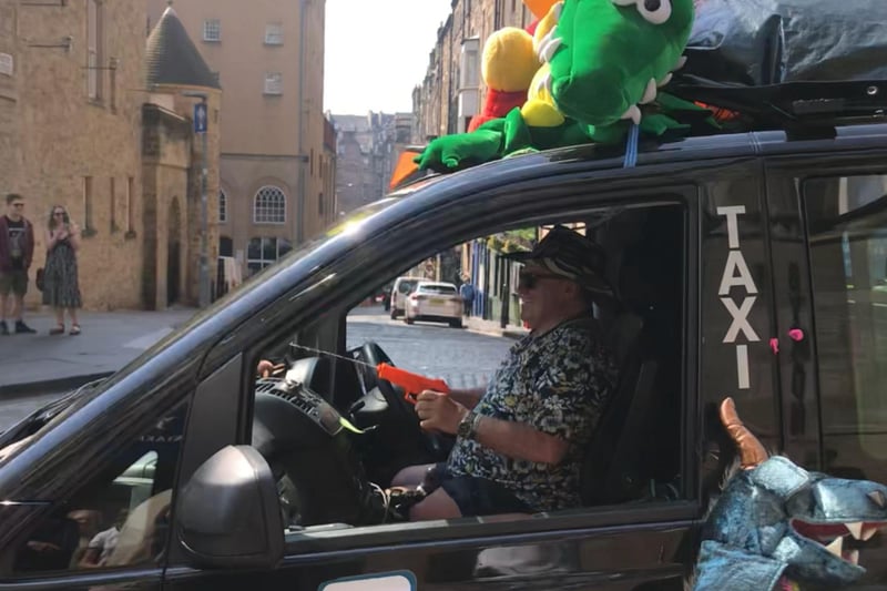 This cabbie had a great day out in his dragon themed taxi