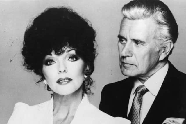 Dynasty stars Joan Collins, who played Alexis Carrington in the original TV series, and John Forsythe, who played her ex-husband Blake (Picture: Keystone/Getty Images)