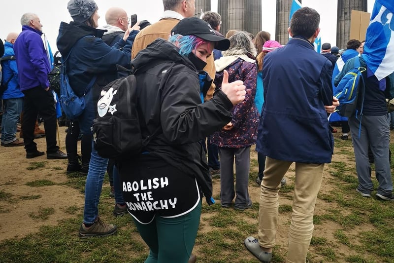 One protester wearing shorts which say "abolish the monarchy".