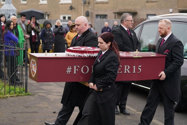The coffin is carried into the church at the funeral of Andrew MacKinnon at St David's Broomhouse Parish Church, Edinburgh. 
Photo: Andrew Milligan/PA Wire
