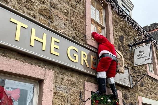 The pub's owner is appealing for the return of the boots so the Santa decoration can be reinstated. Picture: The Green Haddington.