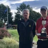 Bathgate's James Wood after receving the Lothians Junior Championship trophy from LGA president Neil Anderson after his win in the final at Murrayfield. Picture: LGA