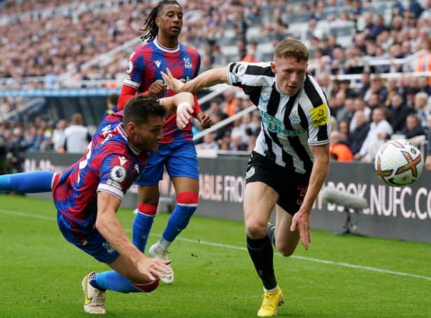 Crystal Palace's Joel Ward and Newcastle United's Elliot Anderson battle for the ball during the Premier League match at St. James' Park earlier this month. Picture: Owen Humphreys /PA