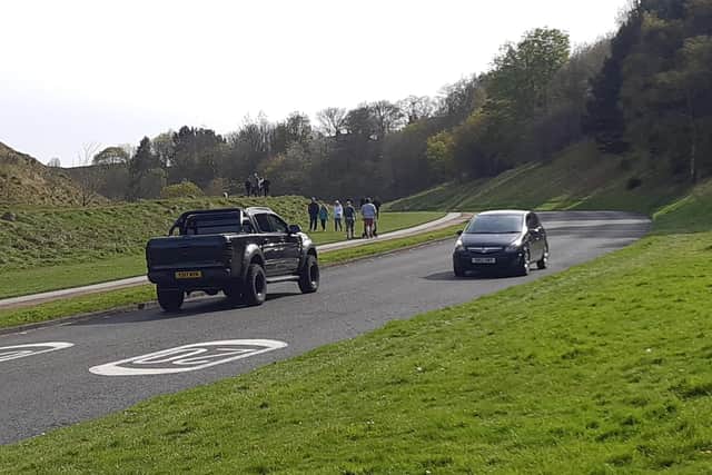 Vehicles in Holyrood Park on Sunday when they are normally banned. Picture: David Gardiner.