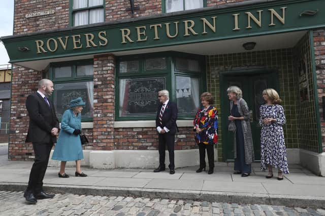 Queen Elizabeth II meets actors (left to right)William Roache, Barbara Knox, Sue Nicholls and Helen Worth, during a visit to the set of Coronation Street.