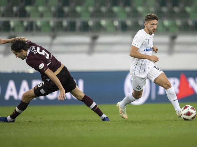 Peter Haring is wrong-footed by Zurich's Donis Avdijaj